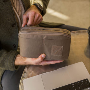 CIVIC Access Pouch 2L in Fossil Brown - held in hand