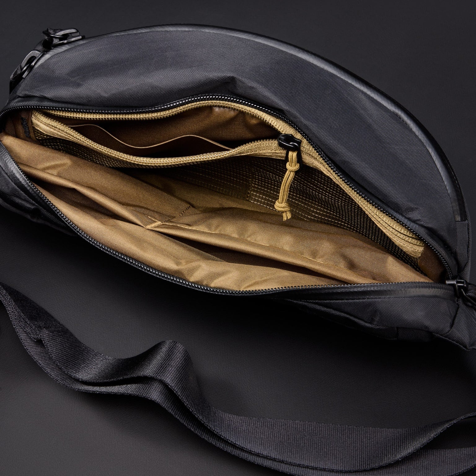 CIVIC Access Sling 2L in X-Pac Black and Coyote Brown - internal zipper pocket with laminated dividers