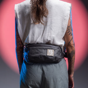 CIVIC Access Sling 2L in Gravel Gray - Ultra - worn as a hip pack