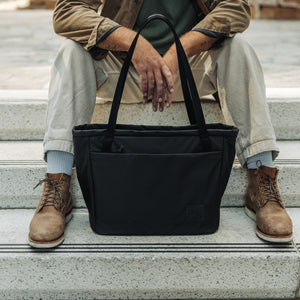 CIVIC Daily Tote 24L in Solution Dyed Black - CDT24 - sitting on steps