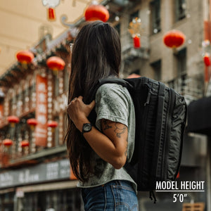 CIVIC Panel Loader 16L - CPL16 - Solution Dyed Black - worn on model in san francisco