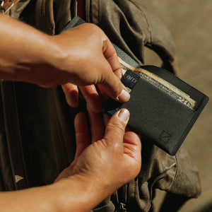 ELEMENT Bifold Wallet - EBW - Solution Dyed Black - lifestyle -pulling card out
