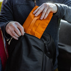 Mountain Panel Loader 22L in Solution Dyed Black, front dump pocket