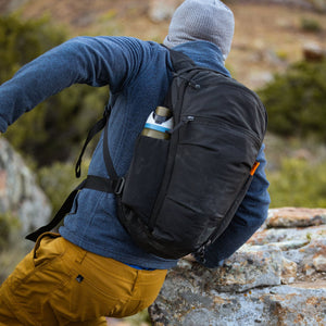 Mountain Panel Loader 22L in Solution Dyed Black, on the trail