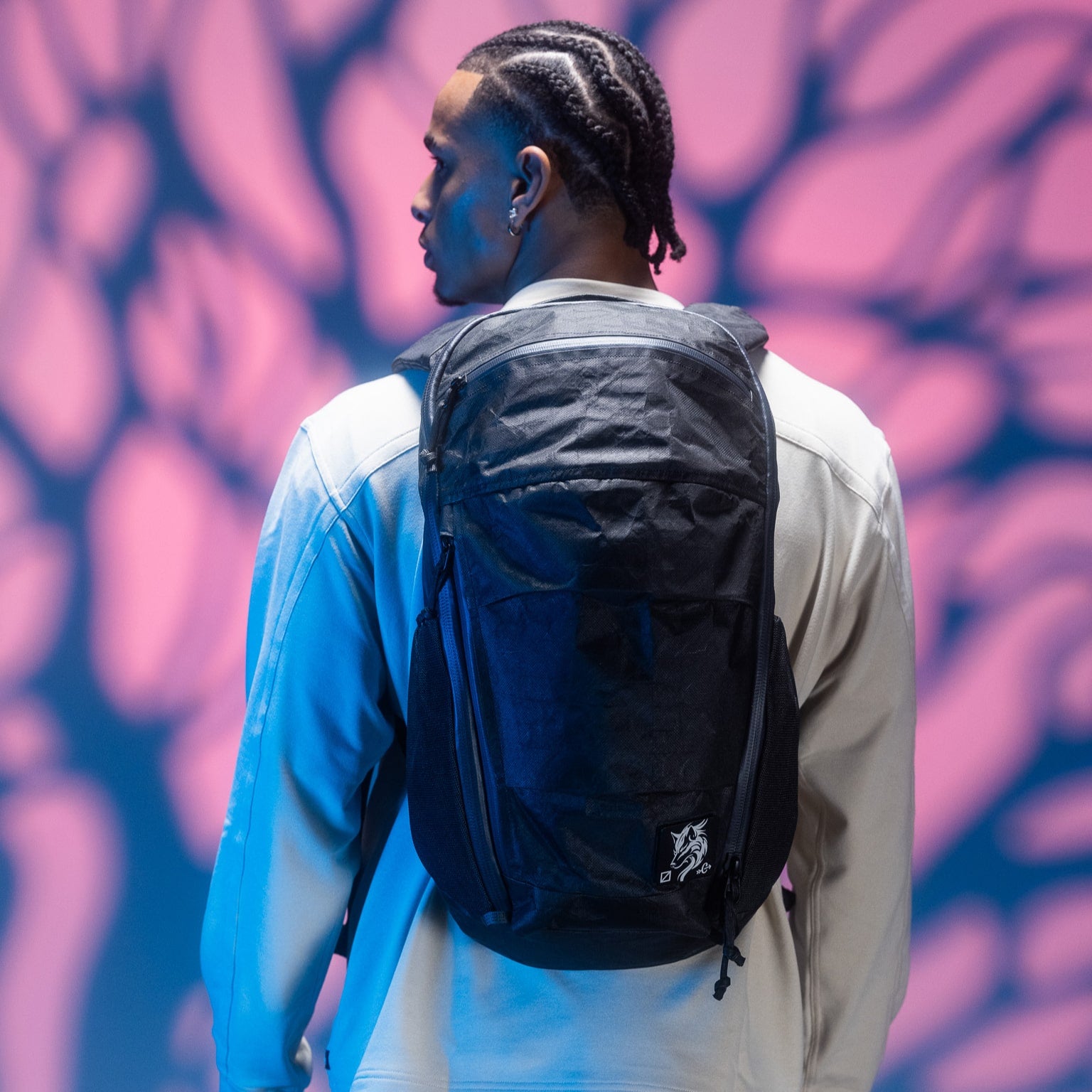 MOUNTAIN Panel Loader 22L in Black Magic - Ultra - Model wearing backpack