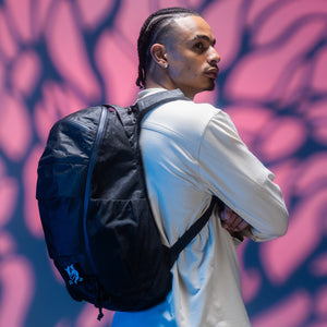 MOUNTAIN Panel Loader 22L in Black Magic - Ultra - person wearing pack side view