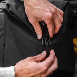 Transit Duffel 35L in Black side buckels