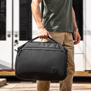 Transit Duffel 35L in Solution Dyed Black - top handle