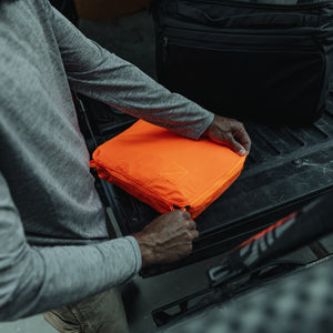 Transit Packing Cube 10L in Hot Orange - zipped close