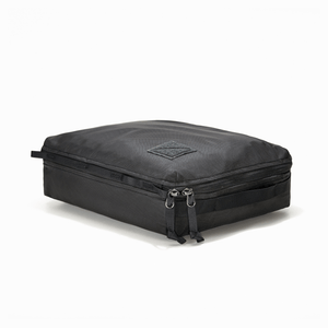 Transit Packing Cube 10L in Black - packed and laid flat