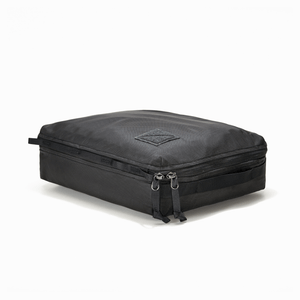 Transit Packing Cube 10L in Black - packed and laid flat
