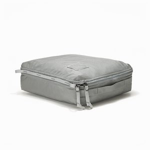 Transit Packing Cube 10L in Standard Gray - packed and laid flat