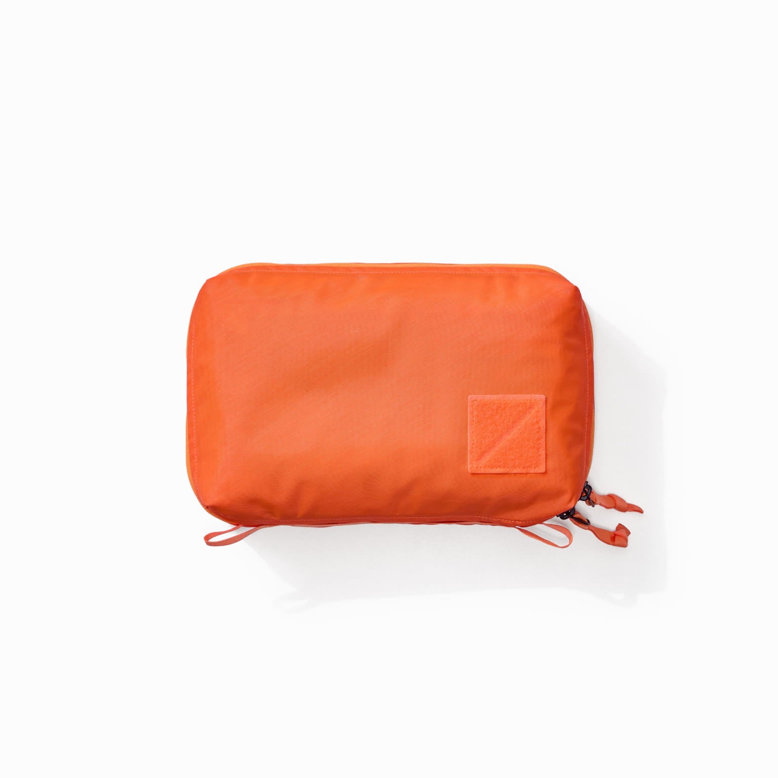Transit Packing Cube 4L in Hot Orange - overhead view Transit Packing Cube 4L in Hot Orange - overhead view [13026a-HTO