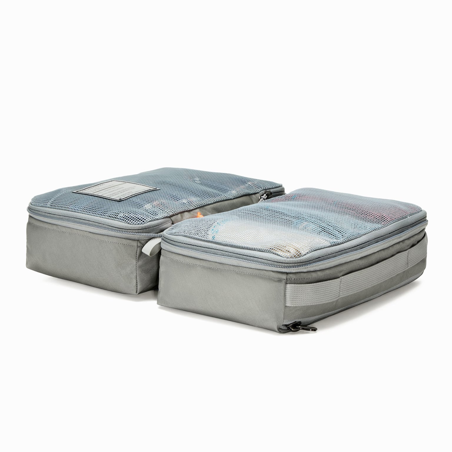 Transit Packing Cube 8L in Standard Gray open and flat on table Transit Packing Cube 8L in Standard Gray open and flat on table [13015a-STG