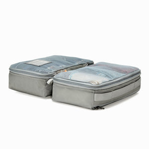 Transit Packing Cube 8L in Standard Gray open and flat on table