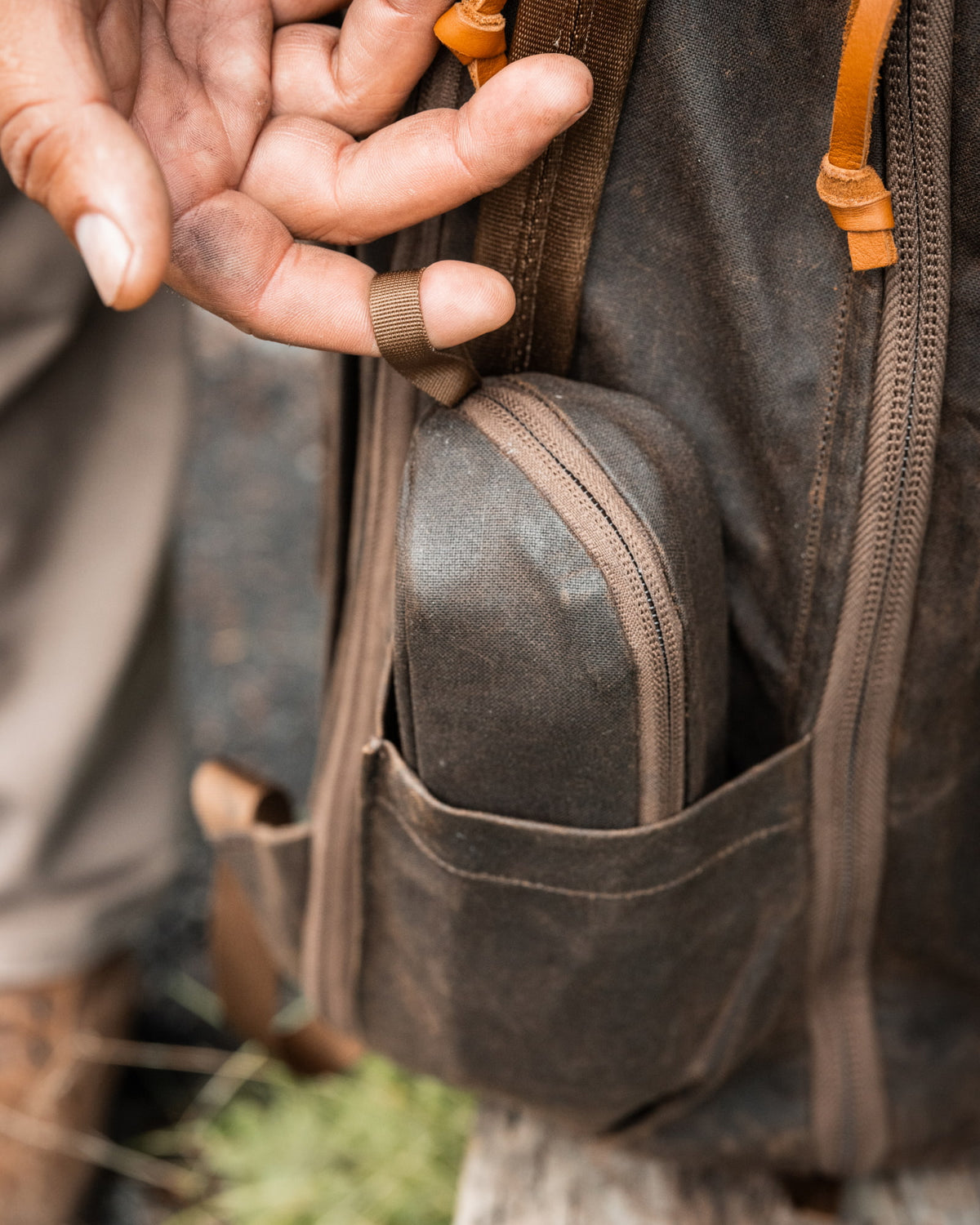 CIVIC Access Pouch 0.5L Waxed Canvas Tan fitted in a bag pocket