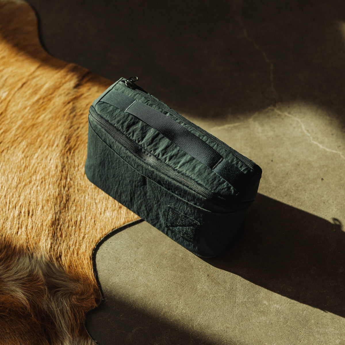 CIVIC Access Pouch 2L in Konbu Dark Navy top handle for carry