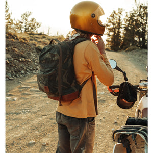 CIVIC Bookbag 22L - Carryology - Waxed Canvas - Camo In Use