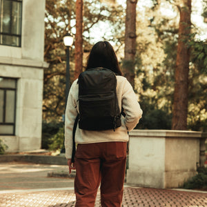 CIVIC Bookbag 22L CB22 in Solution Dyed Black - walking through campus