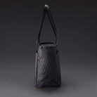 CIVIC Daily Tote 24L in X-Pac Black and Coyote Brown - side profile with magnetic handles