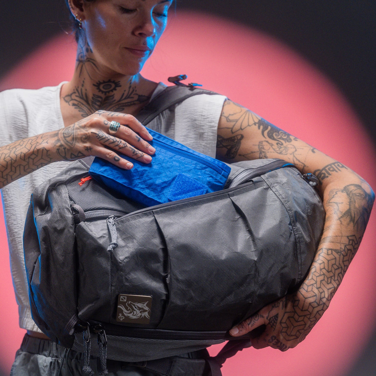 CIVIC Access Pouch - CFP - Blue Flame - stowed in side-access pocket of MOUNTAIN Panel Loader 22L