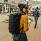 CIVIC Half Zip 22l in Solution Dyed Black - Walking through Boulder side profile CIVIC Half Zip 22l in Solution Dyed Black - Walking through Boulder side profile [13003d-SBK