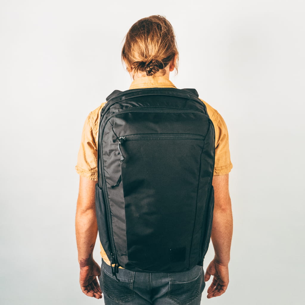 CIVIC Travel Bag 35L in solution dyed black on model [13007c-SBK]
