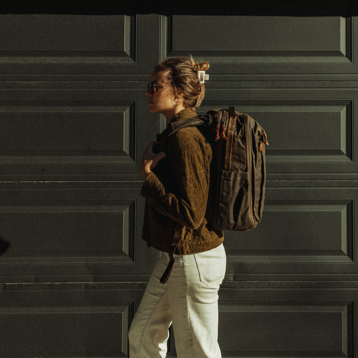 CIVIC Travel Bag 20L in Waxed Canvas - Waxed Tan - size from side view - Model Height 5'7" 170cm [13019cc-WTN]