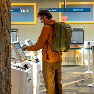 CIVIC Travel Bag 26L in OD Green - at airport checking in