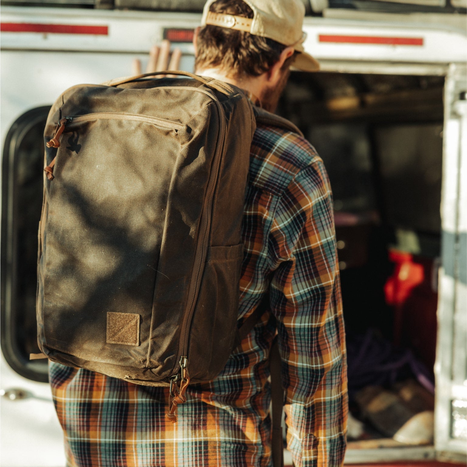 CIVIC Travel Bag 26L in Waxed Canvas - Waxed Tan - on back [13012cc-WTN]