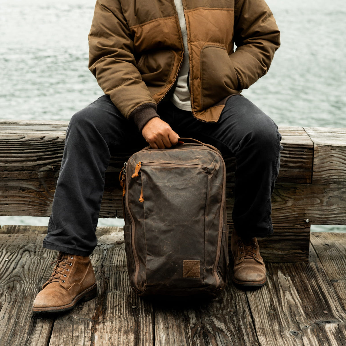CIVIC Travel Bag 26L in Waxed Canvas - Waxed Tan - on ground [13012cc-WTN]