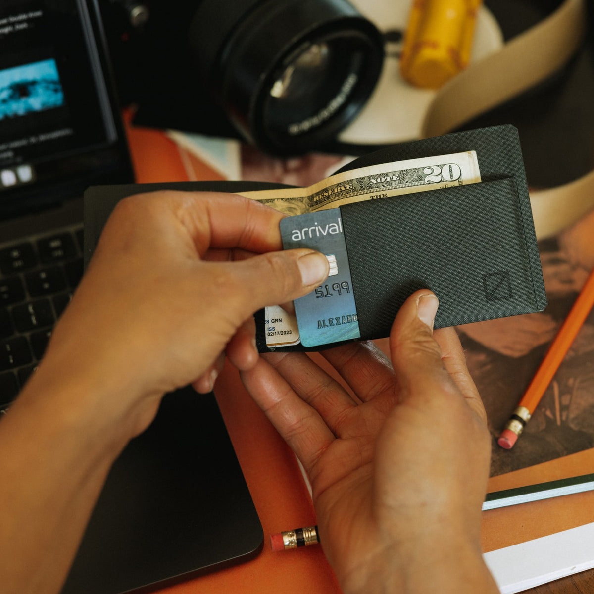 ELEMENT Bifold Wallet - EBW - Solution Dyed Black - lifestyle - pulling cards out