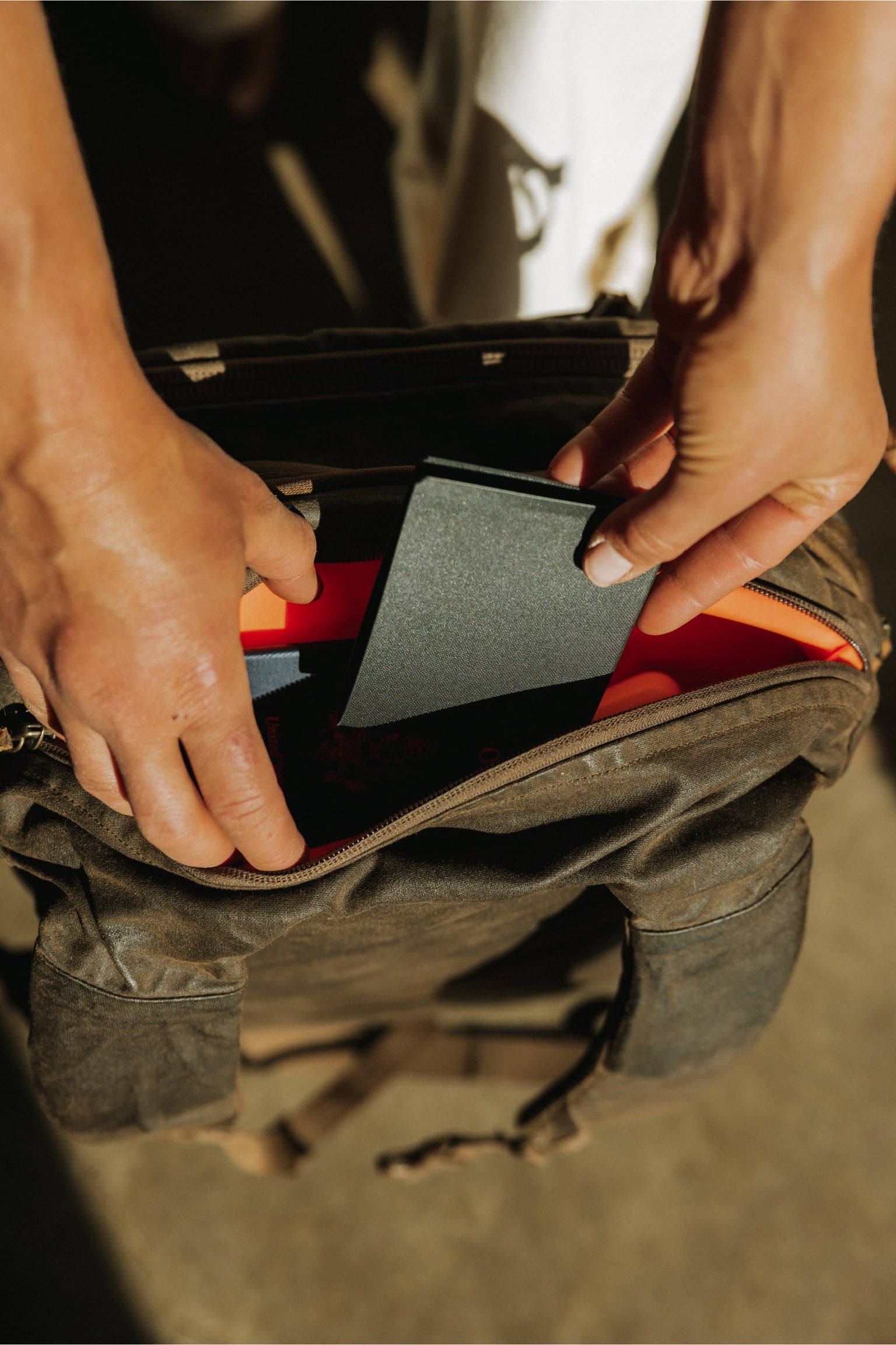 element bifold wallet in solution dyed black fitting into yoke pocket
