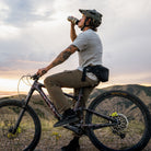 MOUNTAIN HIP PACK 3.5L in Solution Dyed Black - On Bike Resting on Mountain MOUNTAIN HIP PACK 3.5L in Solution Dyed Black - On Bike Resting on Mountain [11003a-SBK