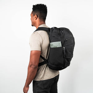 Mountain Panel Loader 22L in Solution Dyed Black, turned slightly on figure