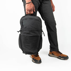 Mountain Panel Loader 22L in Solution Dyed Black, top handle