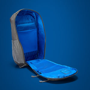 MOUNTAIN Panel Loader 22L in Gravel Gray - Ultra - Blue Flame lining shown in panel loading clamshell opening