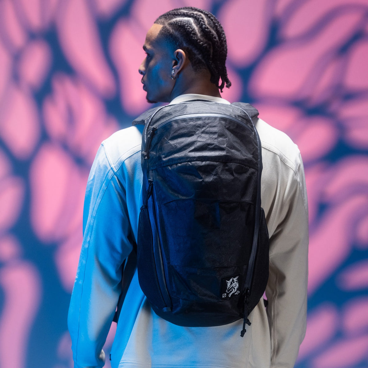 MOUNTAIN Panel Loader 22L in Black Magic - Ultra - Model wearing backpack