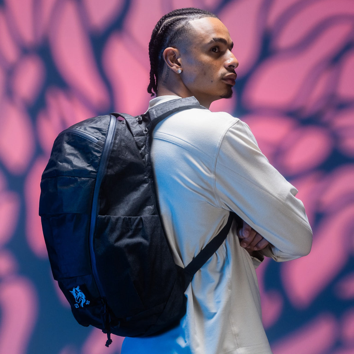 MOUNTAIN Panel Loader 22L in Black Magic - Ultra - person wearing pack side view