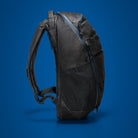 MOUNTAIN Panel Loader 22L in Black Magic. Side View water bottle pockets.