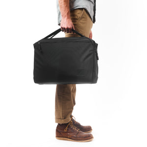 Transit Briefcase 20L - Solution Dyed Black - curved handle on model