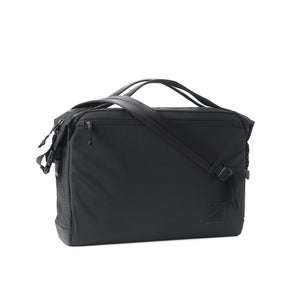 Transit Briefcase 20L - Solution Dyed Black - front with shoulder strap