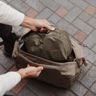 Transit Duffel 25L in Fossil Brown - over hand packing cube Transit Duffel 25L in Fossil Brown - over hand packing cube [13023d-FBN