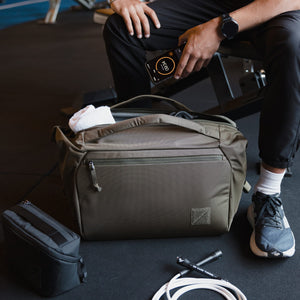 Transit Duffel 25L in OD Green - used in a gym
