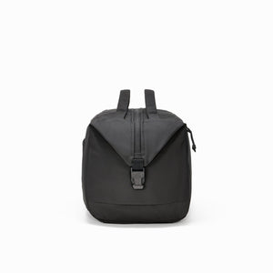 Transit Duffel 25L in Solution Dyed Black - side buckle and end handle