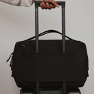 Transit Duffel 25L in Solution Dyed Black - luggage pass through Transit Duffel 25L in Solution Dyed Black - luggage pass through [13023d-SBK