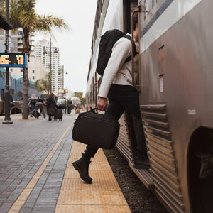 Transit Duffel 25L in Solution Dyed Black - train commute