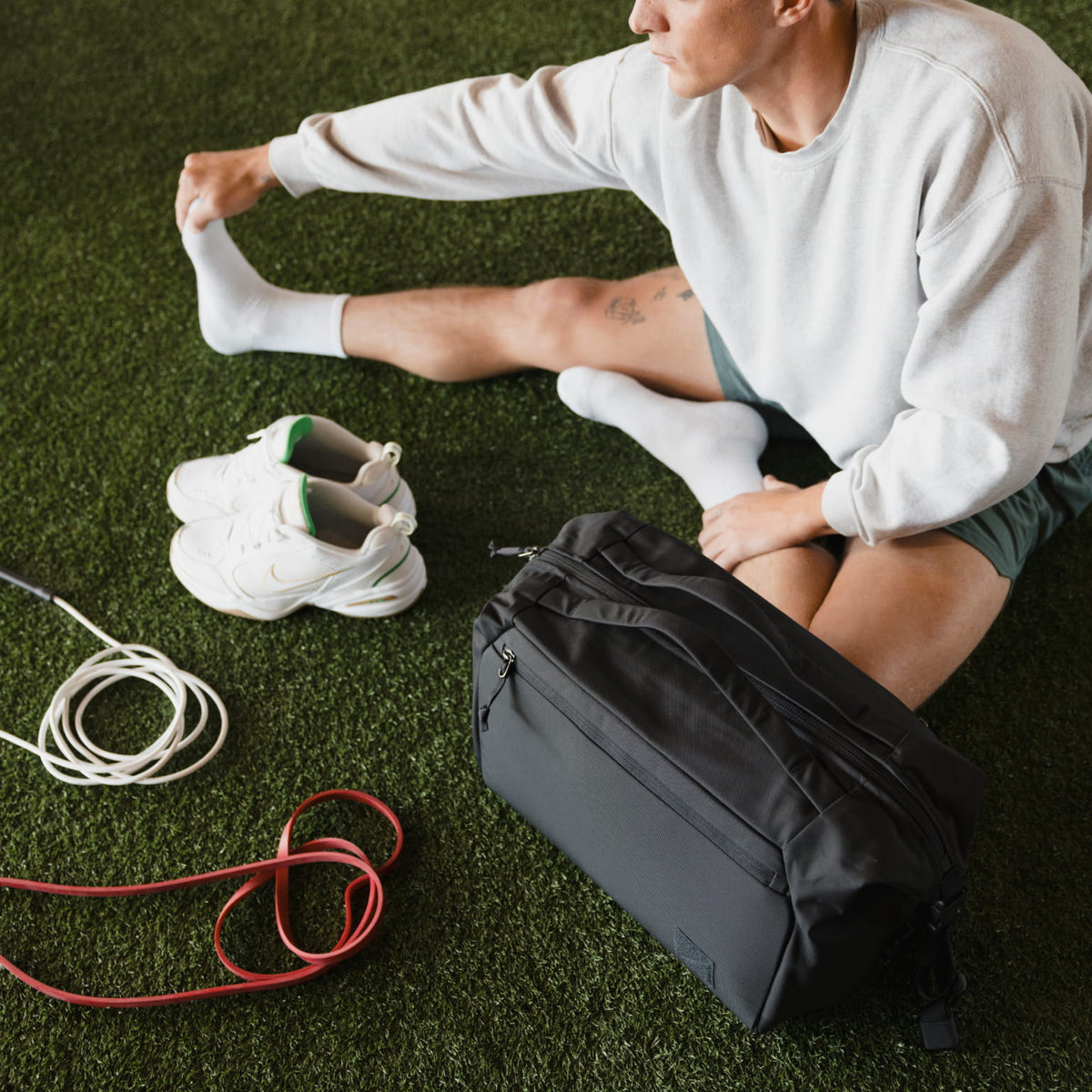 Transit Duffel 25L in Solution Dyed Black - used in the gym