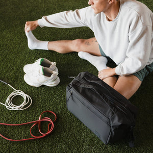 Transit Duffel 25L in Solution Dyed Black - used in the gym
