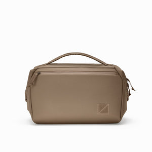 Transit Duffel 25L in Fossil Brown - side profile view